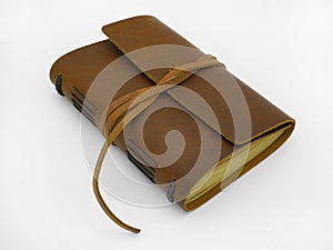 Closed Brown leather bound personal journal or diary.