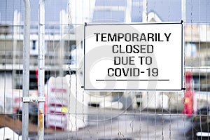 Closed building site sign due to Coronavirus Covid-19