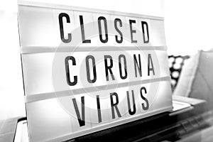 Closed businesses for CoronaVirus pandemic outbreak, closure sign on retail store window banner background. Government shutdown of