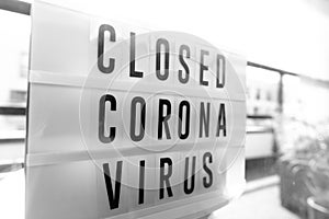 Closed businesses for CoronaVirus pandemic outbreak, closure sign on retail store window banner background. Government shutdown of