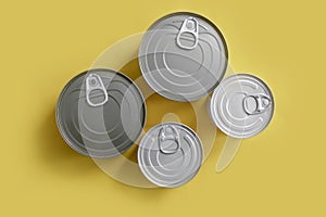 Closed canned food on a colored background