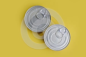 Closed canned food  metallic  on a colored background