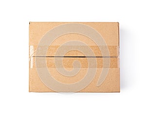 Closed cardboard box on a white