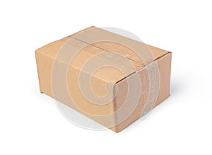 Closed cardboard box on a white