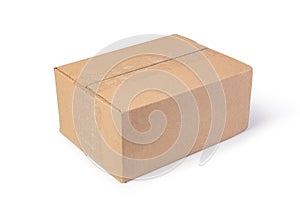 Closed cardboard box on a white