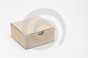 Closed carton box on white background