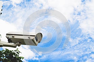 Closed circuit camera with blue sky