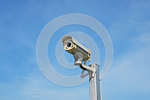 Closed circuit camera or CCTV camera outdoor with sunny and blue sky