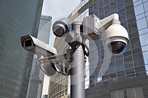 Closed circuit camera Multi-angle CCTV system. on the background of a city