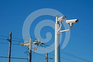 Closed circuit television surveillance cameras and electricity power lines