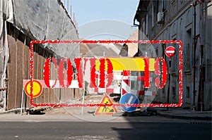 Closed city street construction or reconstruction site with road work barriers and signs due to coronavirus or covid 19 virus pand