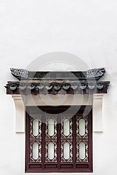 Closed classically designed window of a building in Shanghai, China