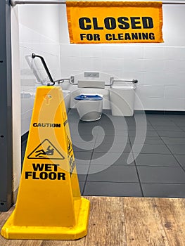 Closed for cleaning sign in public toilet