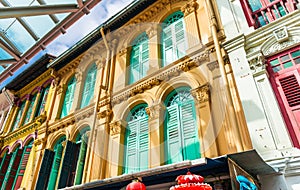 Closed colorful window shutters in Chinatown district of Singapore, Asia