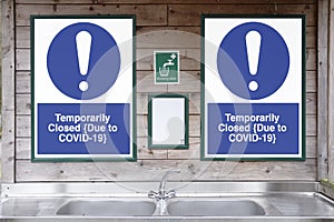 Closed construction site sign due to Coronavirus Covid-19