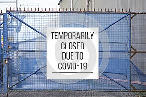 Closed construction site sign due to Coronavirus Covid-19