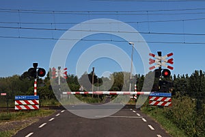 Closed crossway at railways at tweede tochtweg in Nieuwerkerk