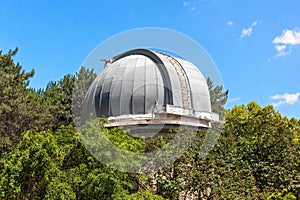 Closed dome of the old telescope in the observatory