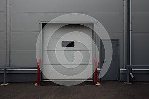 Closed door of transport terminal for truck deliveries and loading