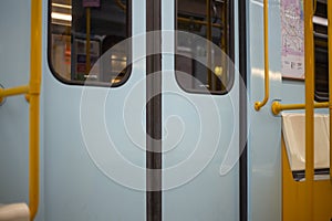 Closed doors in a subway car. An empty train waits at the San Donato metro station in Milan. Public transport concept