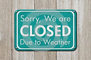 Closed due to weather sign