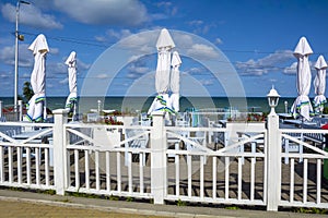Closed due to windy weather, the veranda of a cafe on the shore of the Baltic Sea in the resort town of Zelenogradsk