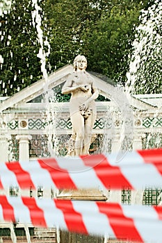 Closed Eve Temptation, Pavilion and Fountain Eve with warning tape in Peterhof, Russia
