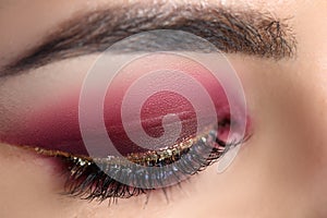 Closed eye with professional maquillage