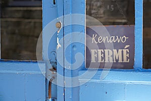 Closed french text means ferme and kenavo in Brittany language on door store text sign board on windows shop