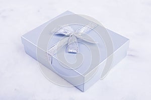 Closed gift box gray color