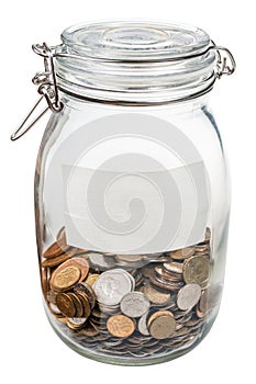 Closed glass jar with empty label and saved coins