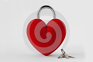 Closed heart shaped padlock with keys on white background - Love concept