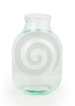 Closed lid three liter transparent glass jar