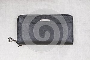 Closed men`s wallet; black purse