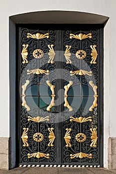 Closed metal door with decorative grille