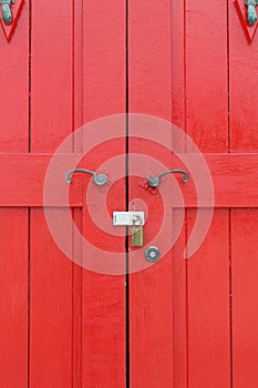 Closed old wooden red door