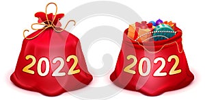 Closed and open santa claus bags with gifts for christmas and new year 2022