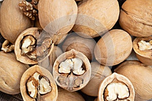 Closed and open walnuts close up