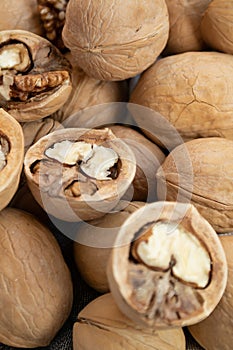 Closed and open walnuts close up