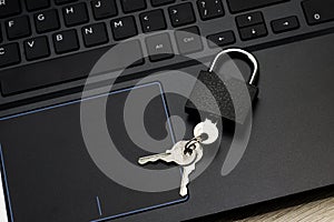 closed padlock with keys on the laptop keyboard concept data protection internet censorship