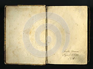 Closed seamless image of old yellowed sheet of paper with dark spots and a facsimile of the inscription.