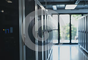 Closed server rack doors with blank bezels in a modern data hall