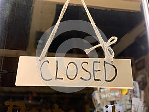 CLOSED shop sign at a shop window in Eastern Europe Latvia Riga