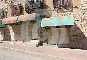 Closed Shops, Houses with Grating, Hebron photo