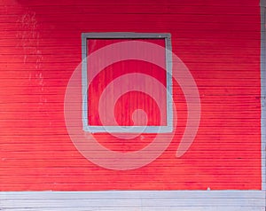 Closed shutter, window isolated on wooden building exterior - p