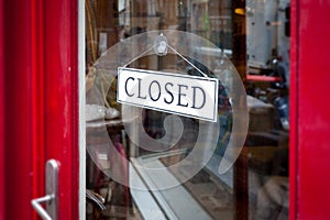An closed sign at the shop door