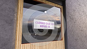 Closed Sign on Shop Window. Store sign. Close-up on a closed sign in the window of a shop displaying the message. The