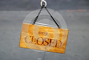 The Closed sign for the store
