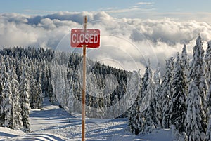 Closed sign at trail head