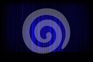 Closed silky luxurouse blue curtain stage backdrop with backlight. Teater curtaines. Vector gradient illustration